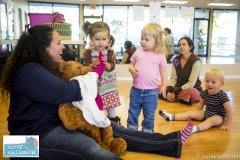 Toddlers participating in a play group aimed at reinforcing and teaching sign language to pre-verbal children
